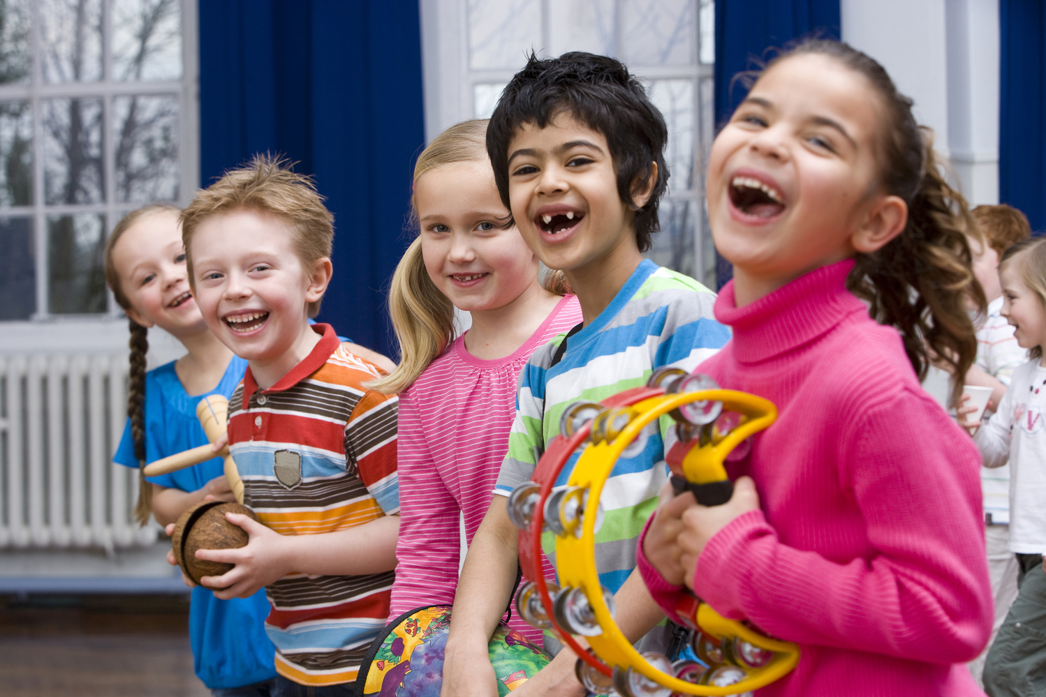 Children Having Fun in Music Class With Their Instruments